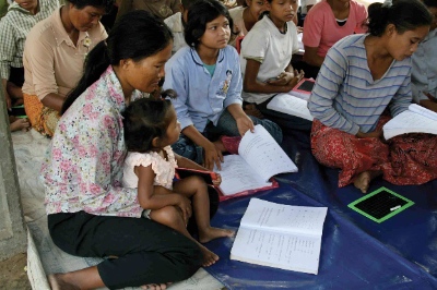 women and children learning